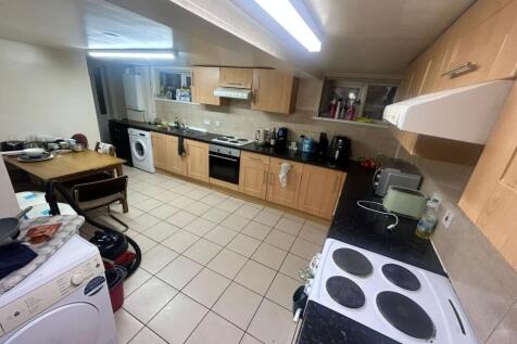 A modern and well-equipped kitchen featuring wo...