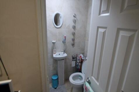 A clean and well-maintained bathroom with a toi...