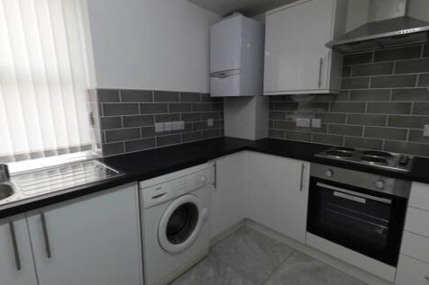 Modern and well-maintained kitchen area with am...