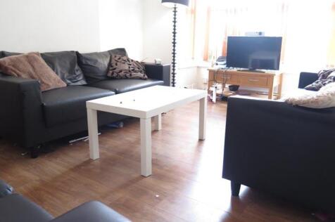 Bright and inviting living room featuring comfo...