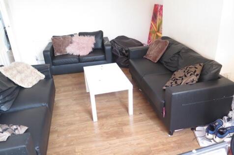 A contemporary living room featuring multiple c...