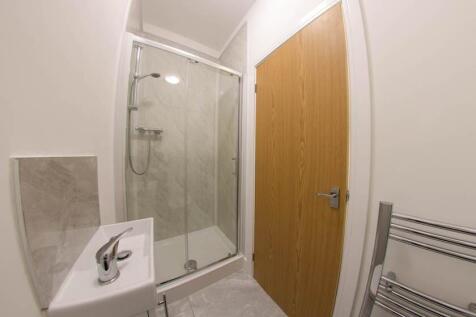 A clean and well-maintained bathroom featuring ...