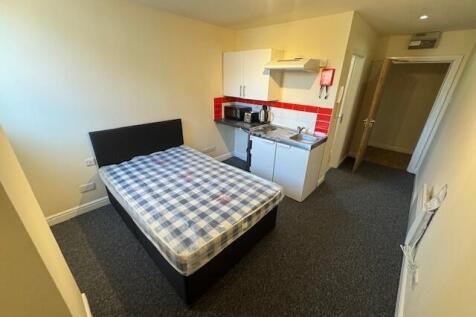 A compact but functional student kitchen area f...