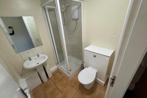 A clean and well-maintained bathroom featuring ...