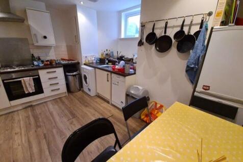 Bright and contemporary kitchen with ample coun...