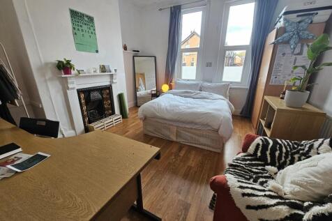 A bright and welcoming living room filled with ...