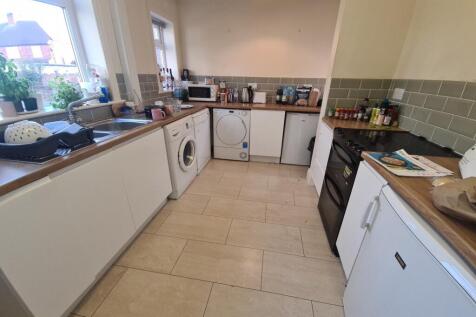 A well-maintained kitchen area with ample count...