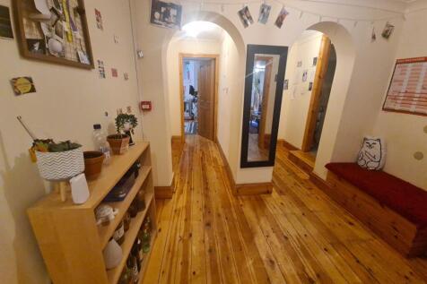 A welcoming exterior shot of the front of a cha...