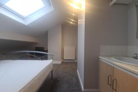 A clean and well-maintained bathroom with ample...