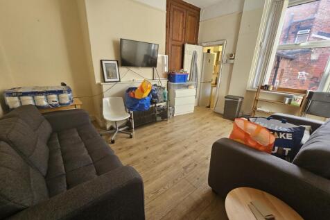 A cozy and inviting living room featuring two c...