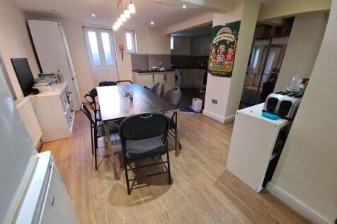 Bright and spacious living room featuring moder...