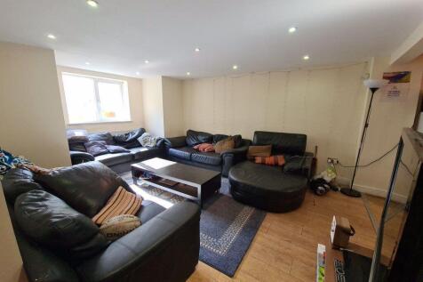 Spacious and modern living room with ample seat...
