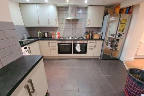 Modern and well-maintained kitchen with ample c...