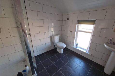 A bright and clean bathroom featuring a modern ...