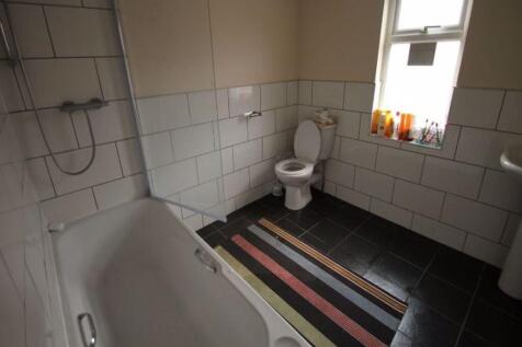 A clean and well-maintained bathroom with a lar...