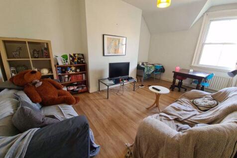 Bright and welcoming living room with comfortab...