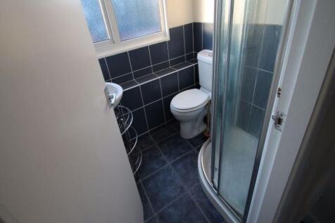 A clean and well-maintained bathroom featuring ...