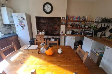 A bright and inviting kitchen with ample worksp...