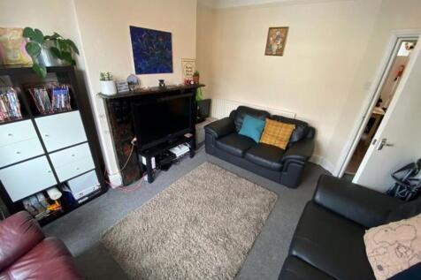 A welcoming living room featuring comfortable s...