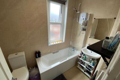 A bright and well-maintained bathroom featuring...