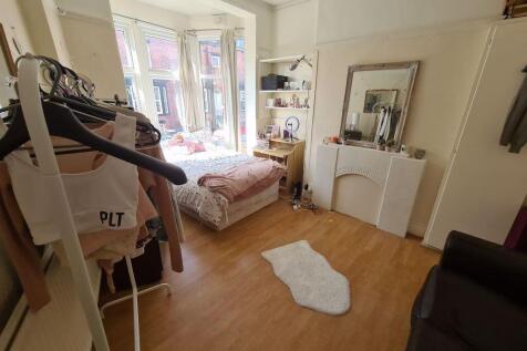 Bright and inviting master bedroom featuring a ...