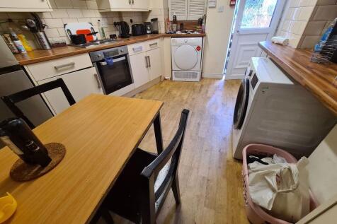 A bright and functional kitchen featuring woode...
