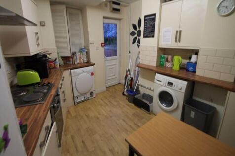 A well-maintained kitchen featuring modern appl...