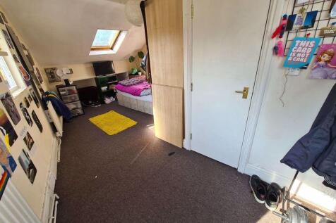 A compact and tidy single toilet room featuring...