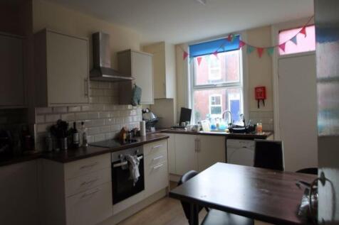 A cozy kitchen area with a window providing nat...