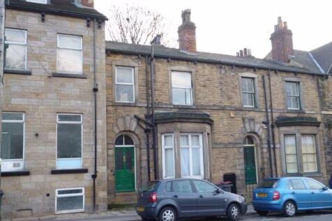 A charming traditional townhouse facade with a ...