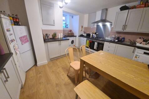 Bright and inviting kitchen area with plenty of...