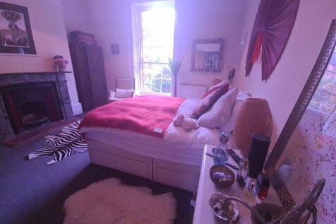 A spacious and well-maintained master bedroom f...