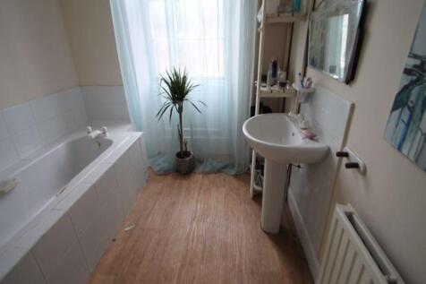 A clean and well-maintained bathroom featuring ...