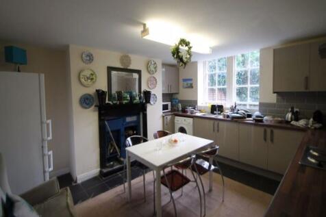 A well-lit, modern kitchen with ample counter s...