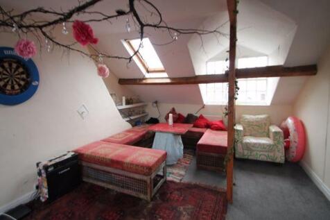 A cozy and inviting living room featuring comfo...