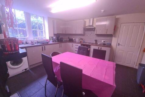 A bright, well-maintained kitchen featuring amp...