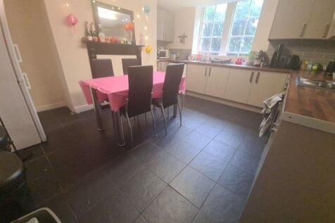 A bright and welcoming kitchen area with ample ...