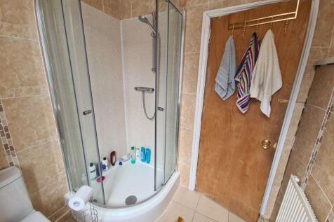 A clean and well-maintained bathroom featuring ...