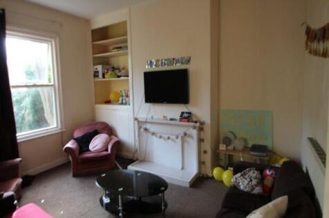 A modern and welcoming living room featuring co...