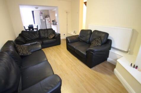 Modern and spacious living room with comfortabl...