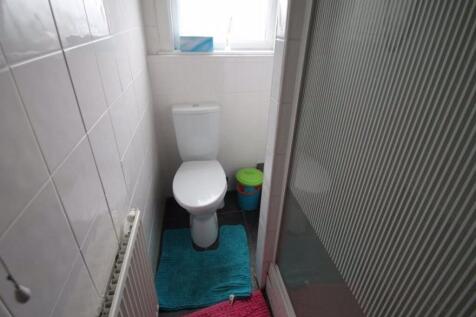 A clean and well-maintained bathroom featuring ...