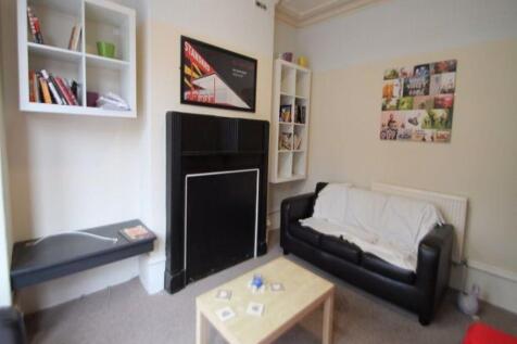 A modern, well-maintained living room featuring...