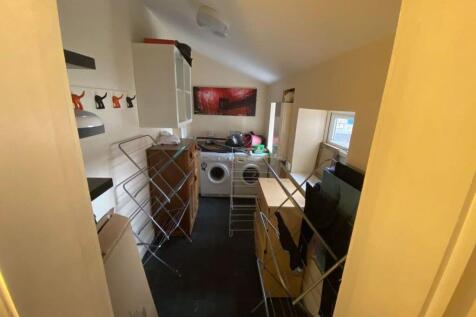 Bright and inviting living room featuring ample...