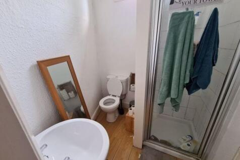 A clean and well-maintained bathroom featuring ...
