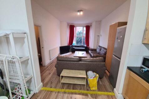 A welcoming and well-maintained living room wit...