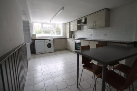 A functional kitchen with natural light coming ...