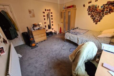 A cozy living room equipped with casual furnitu...