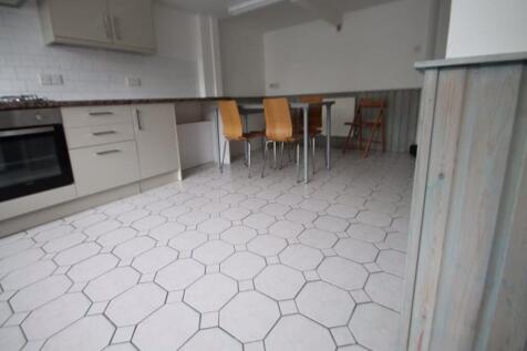 A clear exterior shot showcasing the front faca...