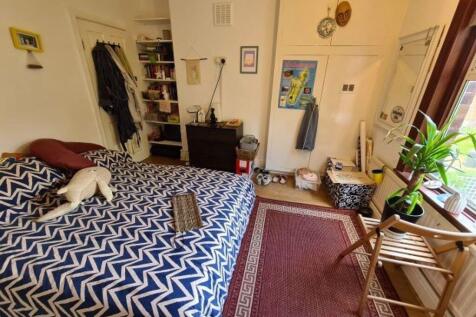 A bright, welcoming living room filled with nat...