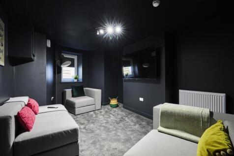 Modern and cozy living room with comfortable se...